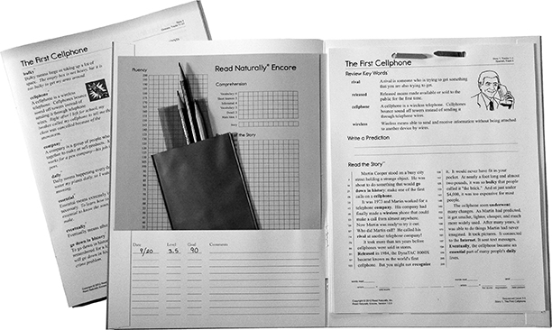 Folder with stories, graph, glossary, red/green pouch, reading guide, and pencil